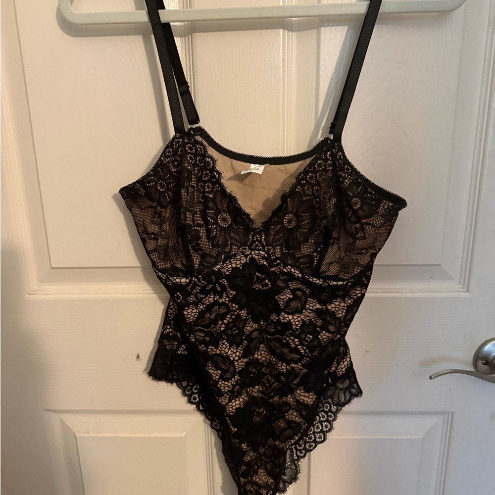 Black Lace Sheer Bodysuit new size L.